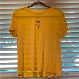 Bright yellow tshirt with design